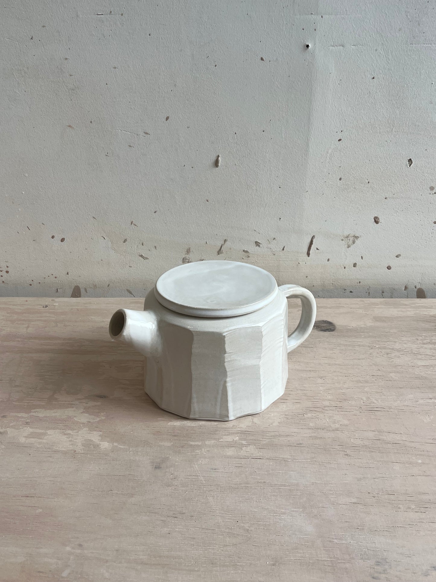 Carved teapot